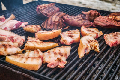 Raw pork juicy pieces steak of meat beef on the grill