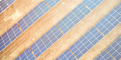 Solar power station aerial view. rows of solar photovoltaic panels. solar energy farm aerial view