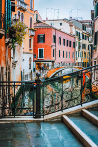 Canal amidst buildings in city