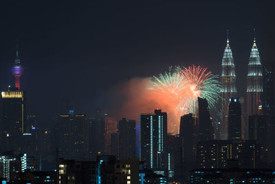 Firework display at night