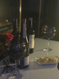 Close-up of wine bottles on table