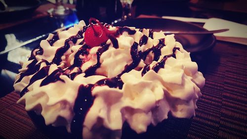 Close-up of cake served on table