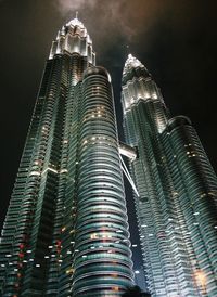 Low angle view of modern building at night