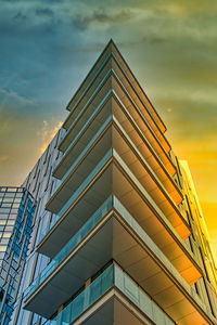 Low angle view of modern building against sky