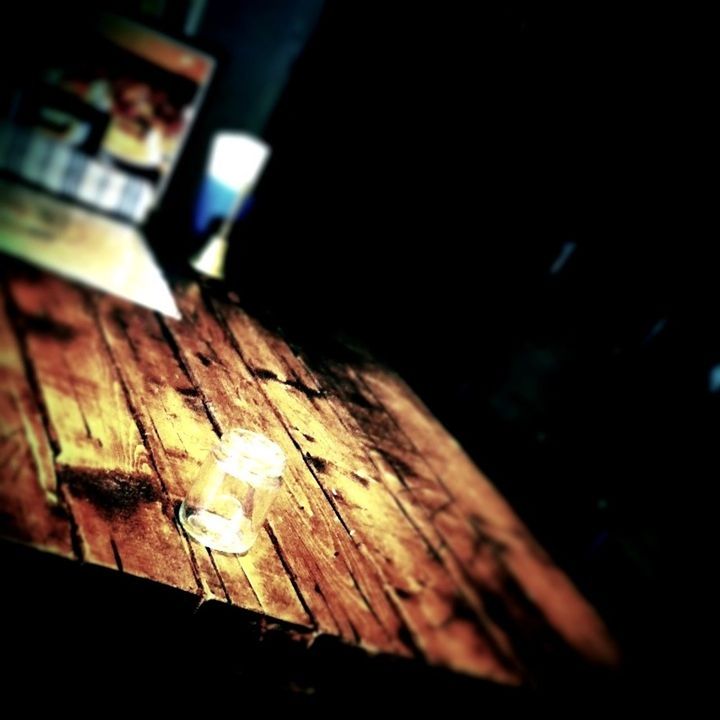 indoors, night, wood - material, selective focus, dark, close-up, wooden, focus on foreground, no people, high angle view, shadow, wood, auto post production filter, sunlight, home interior, house, built structure, illuminated, table