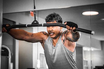 Man exercising in gym