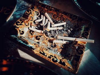 High angle view of cigarette on table