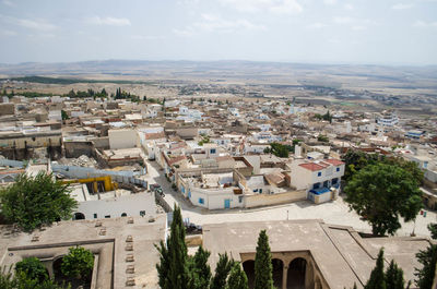 High angle view of houses against sky