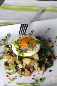 High angle view of potato with poached egg served in plate