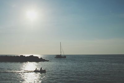 Boat sailing in sea