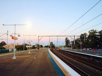 Railway tracks against clear sky