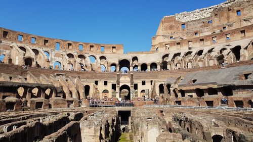 Exterior of historic building against sky in city colosseum 