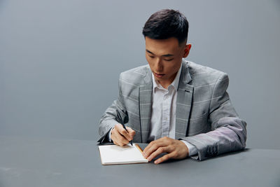 Businesswoman working at desk in office