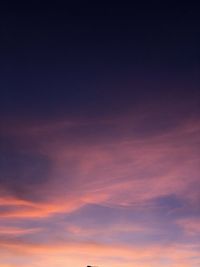 Low angle view of dramatic sky during sunset