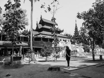 Woman standing in park