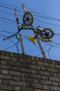 Low angle view of built structure against blue sky