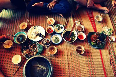 High angle view of food on straw mat