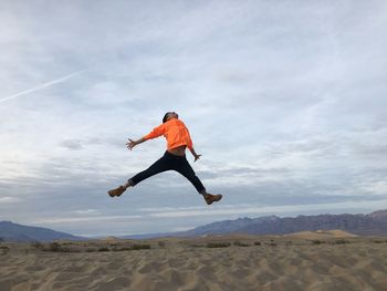 Man jumping in desert