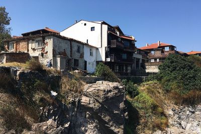 Low angle view of buildings against clear sky