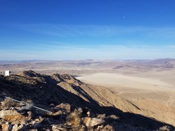 High angle view of landscape against blue sky