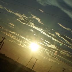 Low angle view of vapor trails in sky