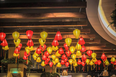 Multi colored lanterns hanging in row