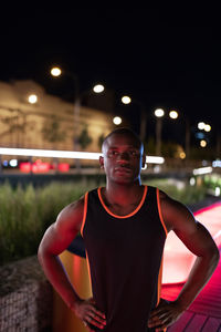 Confident black runner on street