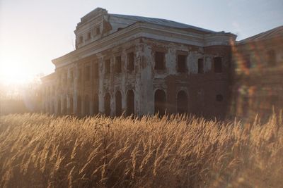 View of built structure on field against clear sky