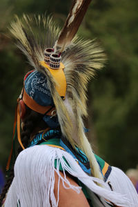 Rear view of woman and bird