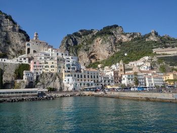 Buildings in city at waterfront