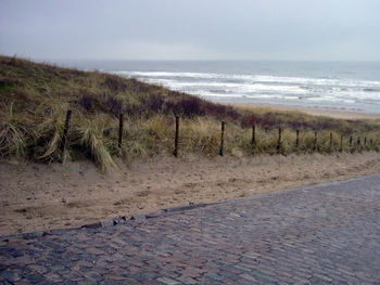 Scenic view of beach against sky