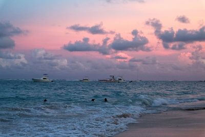 Scenic view of sea against sky at sunset