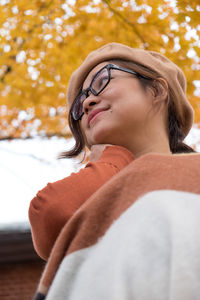 Low angle view of young woman