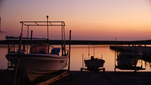 Okinawa fishing port and boat in red at sunset miyako island, a remote island in okinawa prefecture