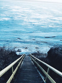 High angle view of pier amidst sea