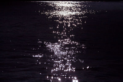 Close-up of illuminated water at night