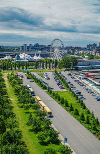 High angle view of ferris wheel in city