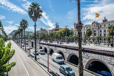 View of cars on street in city