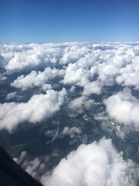 Aerial view of clouds against blue sky