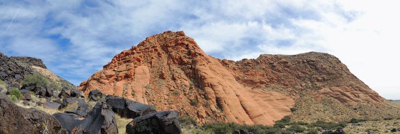 Sandstone and lava rock mountains  red cliffs national conservation area yellow knolls st. george