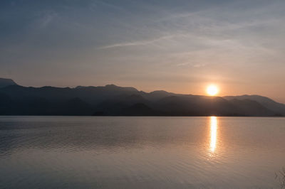 Scenic view of mountains against sky during sunset