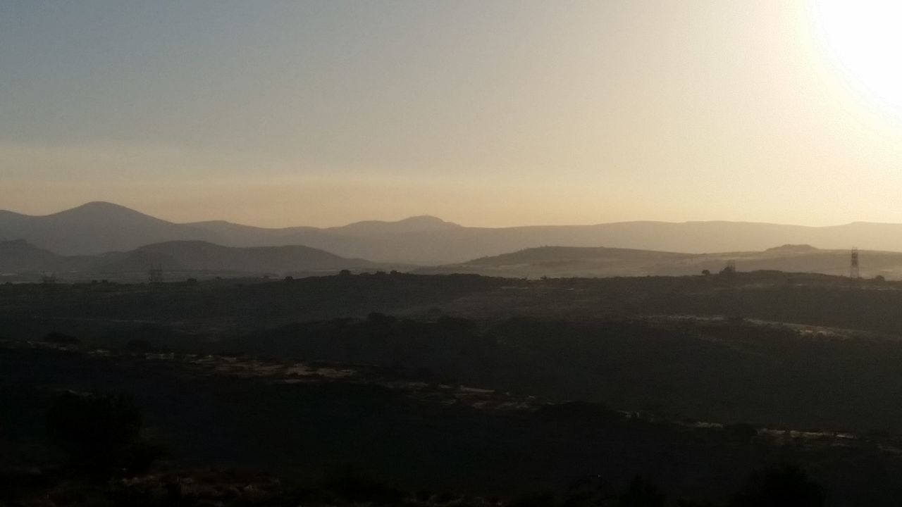 mountain, silhouette, landscape, nature, sun, clear sky, no people, sunset, outdoors, sky, beauty in nature, tree, day