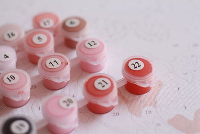 High angle view of various buttons on table