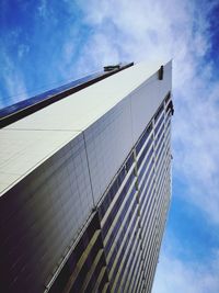 Low angle view of skyscraper against sky