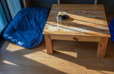 High angle view of chair on table at home