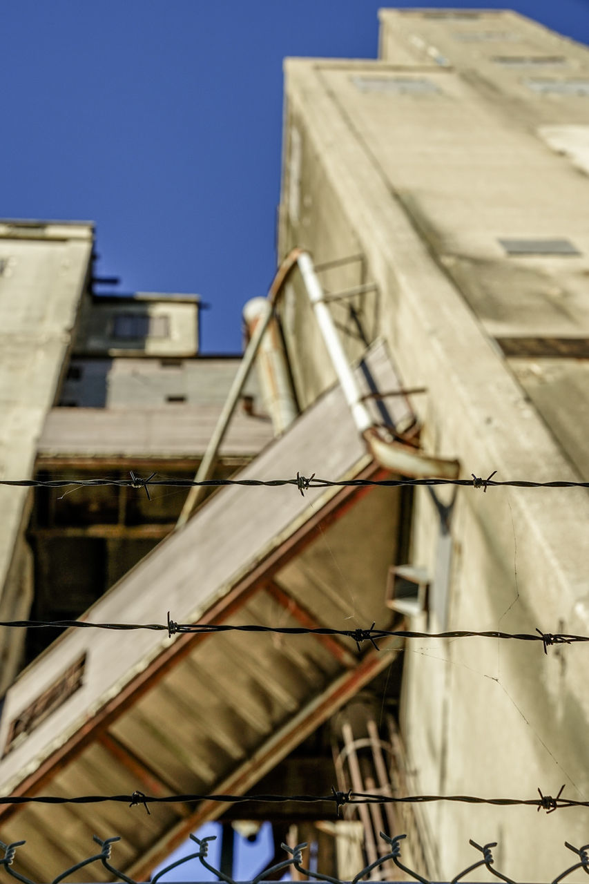 LOW ANGLE VIEW OF BUILDING UNDER CONSTRUCTION