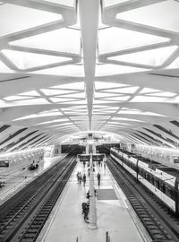 High angle view of people at railroad station