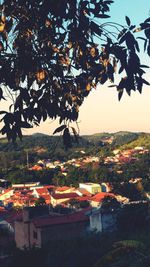 Aerial view of townscape against sky