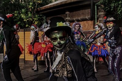 People in traditional costume celebrating day of the dead festival