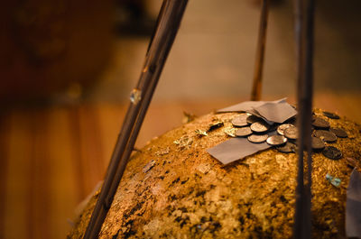 Close-up of broken metal on wood